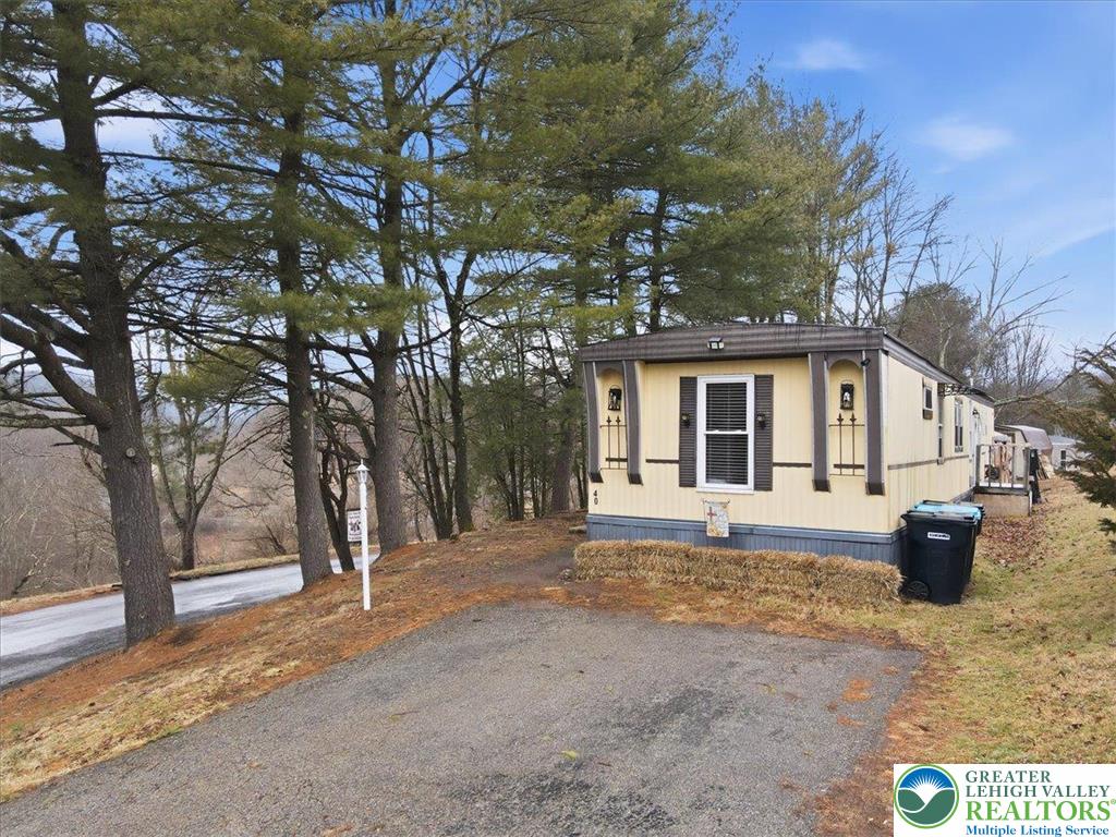 40 Apache Lehighton, PA 18235 - Photo 26 of 32 a view of a house with a yard covered in snow