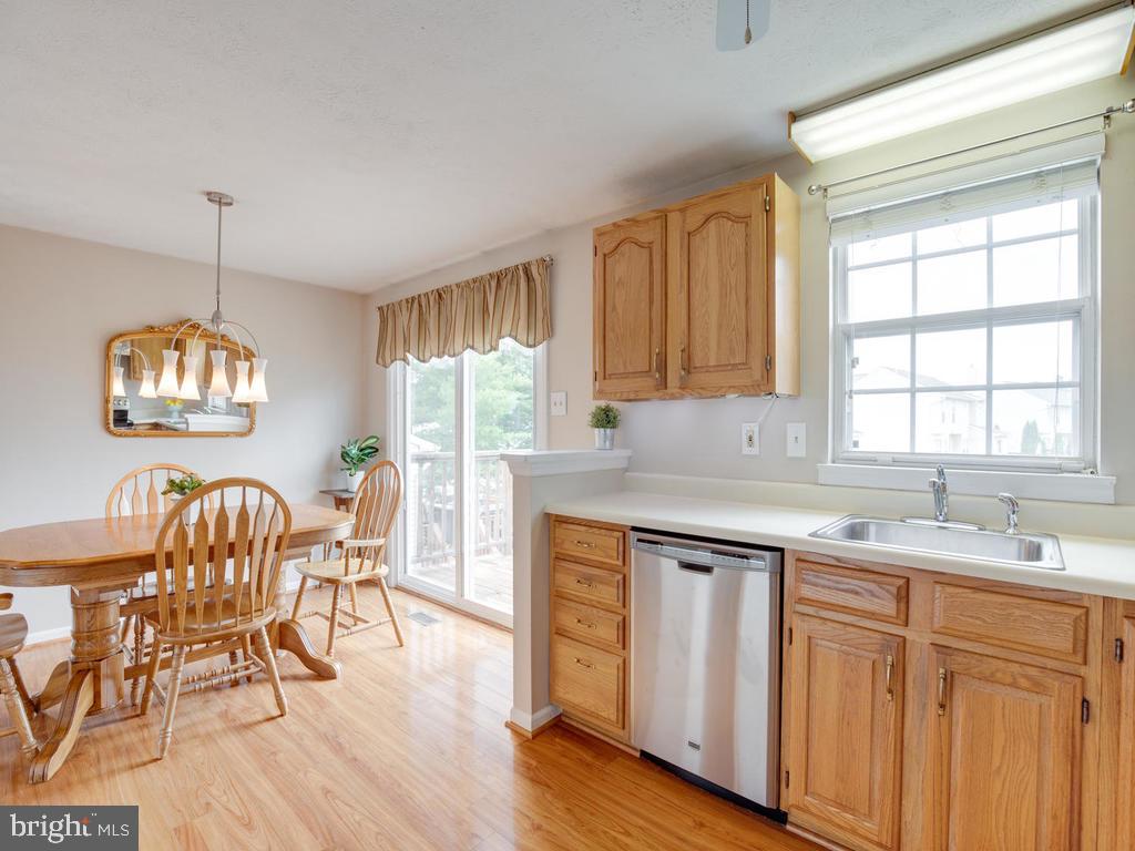 2102 Cross Trails Road Baltimore, MD 21244 - Photo 11 of 39 Open from the kitchen to the dining room