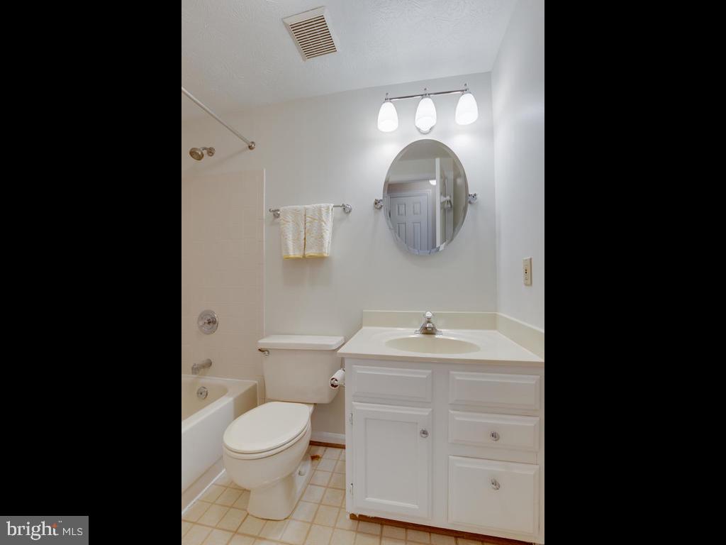 2102 Cross Trails Road Baltimore, MD 21244 - Photo 23 of 39 Hallway bathroom with updated mirror & lights