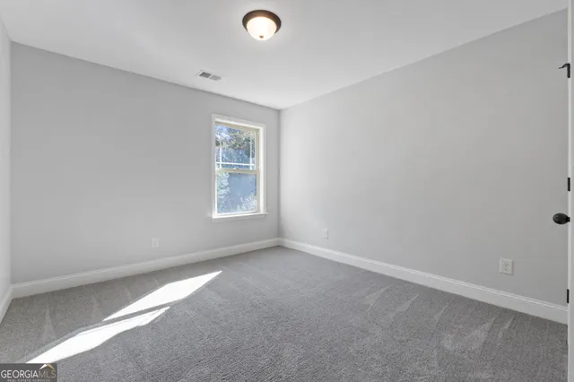 a view of a swimming pool with an outdoor space