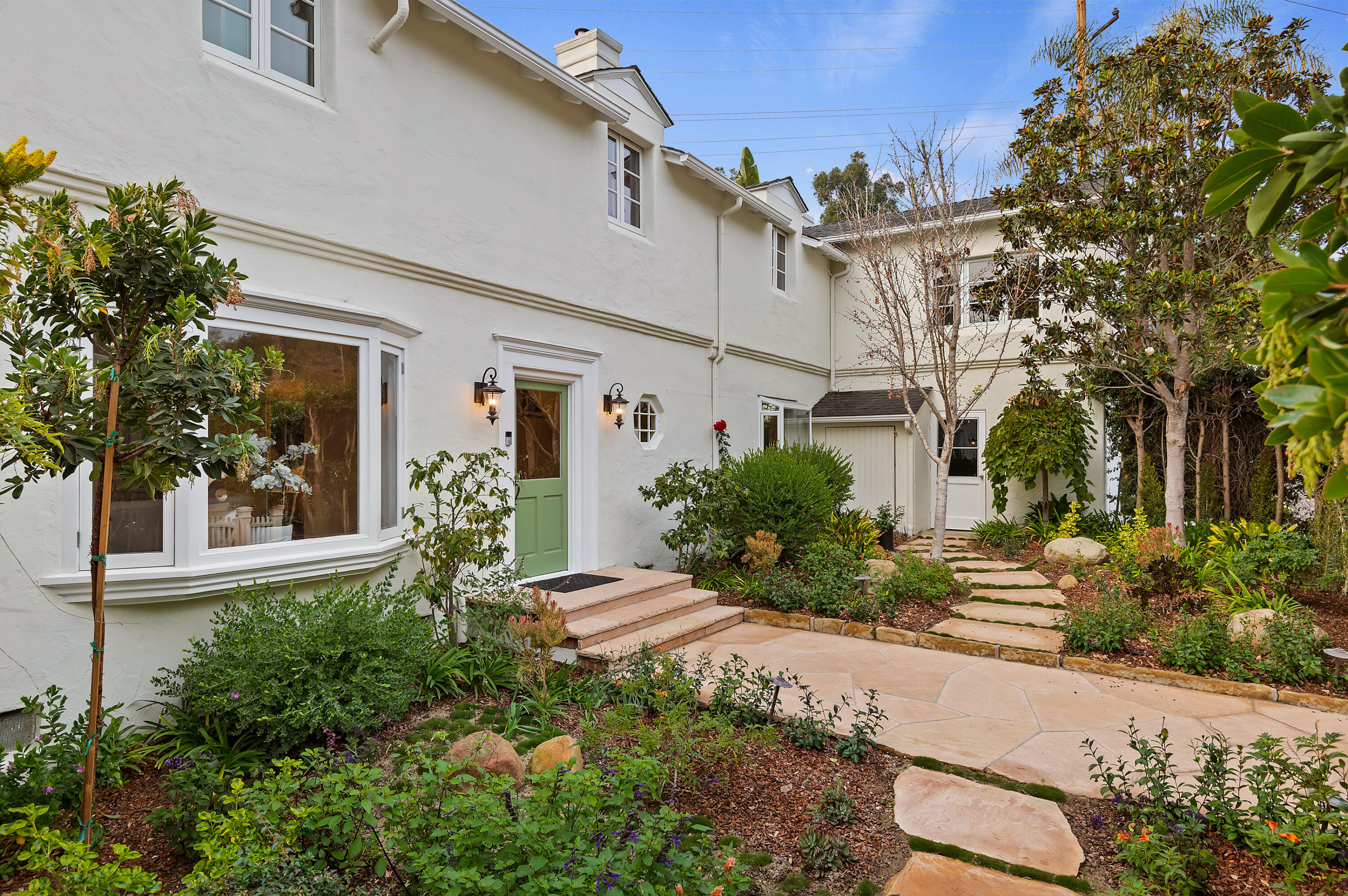 189 Hermosillo Road Montecito, CA 93108 - Photo 7 of 47 front view of a house with a small yard