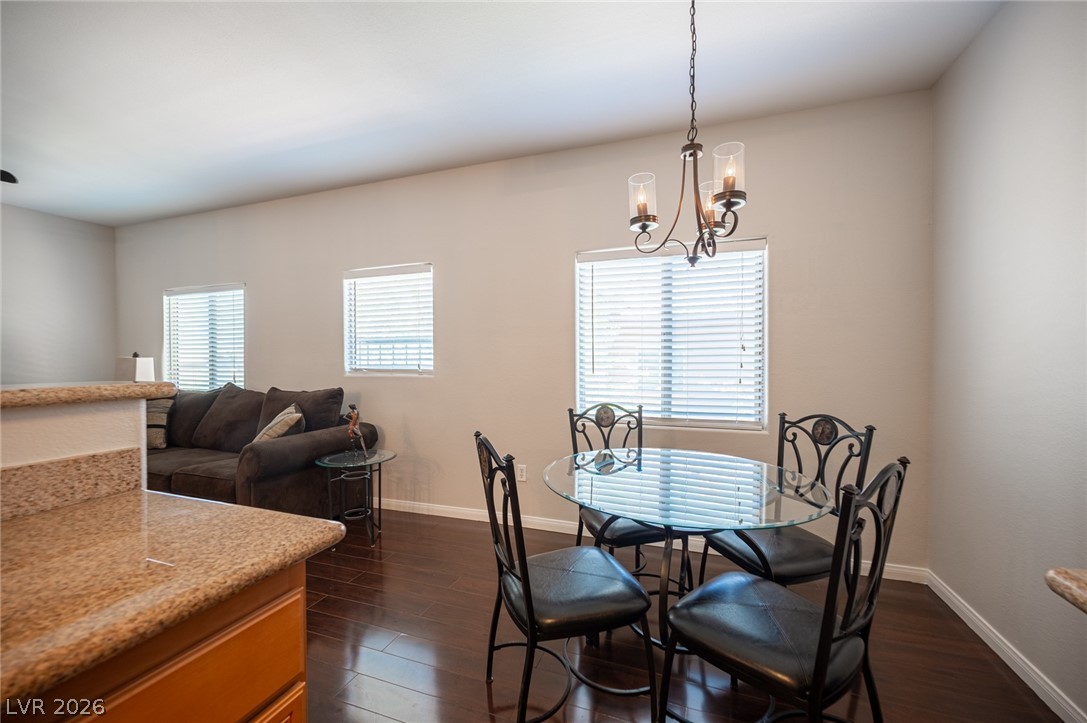 7701 West Robindale Road, Unit 274 Las Vegas, NV 89113 - Photo 11 of 38 This inviting space features gleaming hardwood floors and ample natural light, perfect for everyday living.