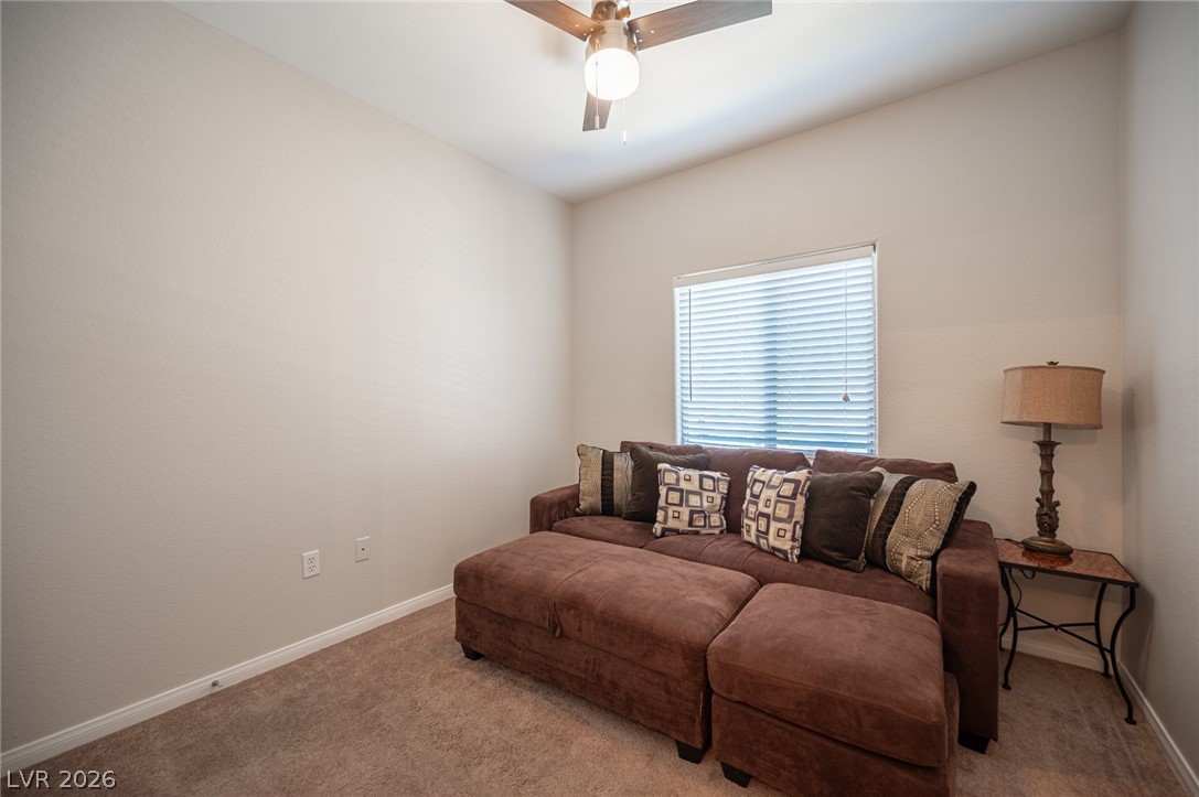 7701 West Robindale Road, Unit 274 Las Vegas, NV 89113 - Photo 20 of 38 This versatile room offers comfortable carpeted flooring and an elegant ceiling fan for climate control.