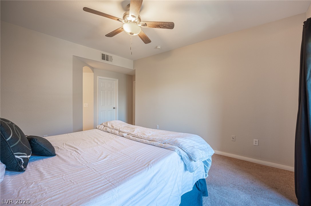7701 West Robindale Road, Unit 274 Las Vegas, NV 89113 - Photo 30 of 38 This inviting bedroom provides a comfortable and tranquil retreat for relaxation.