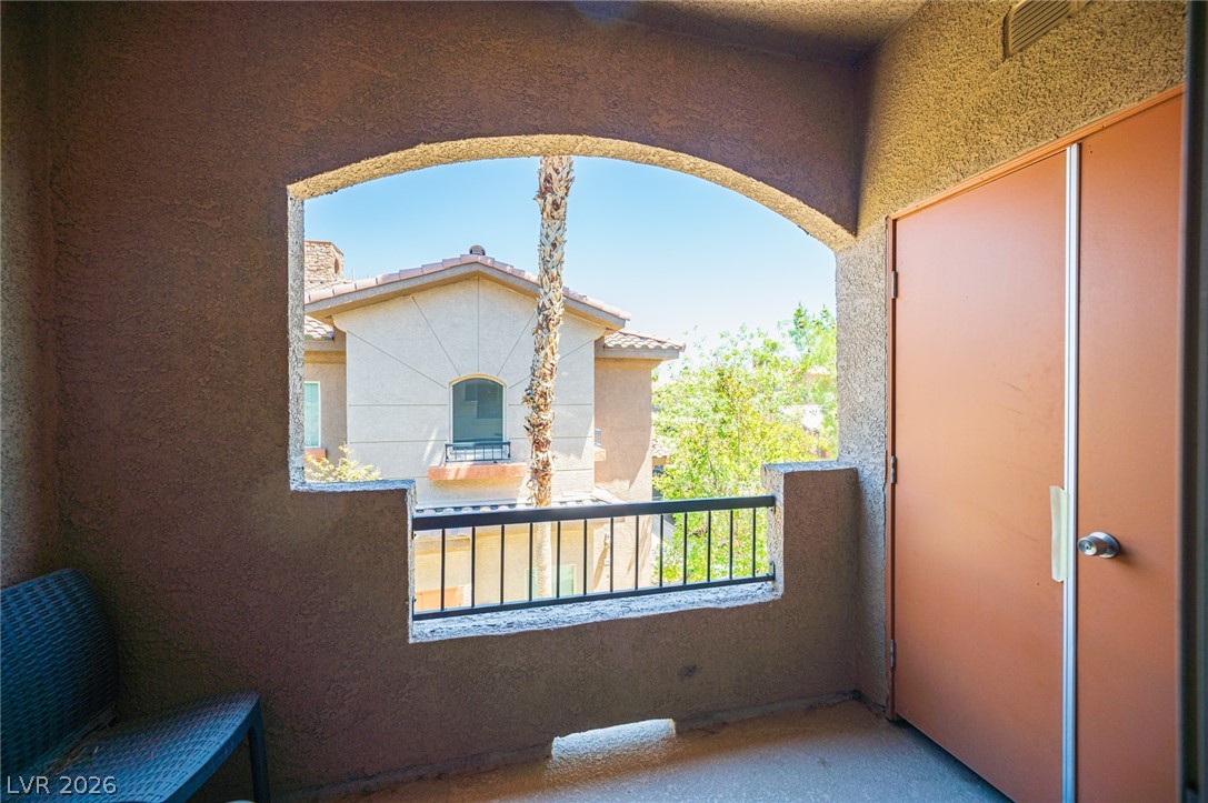 7701 West Robindale Road, Unit 274 Las Vegas, NV 89113 - Photo 33 of 38 This private balcony offers tranquil outdoor living with views of the neighborhood.