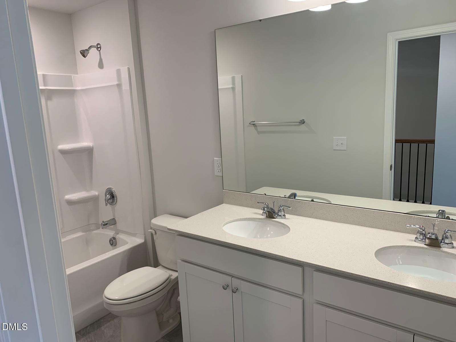 233 Broomside Avenue Raleigh, NC 27603 - Photo 13 of 18 a bathroom with a sink toilet and shower