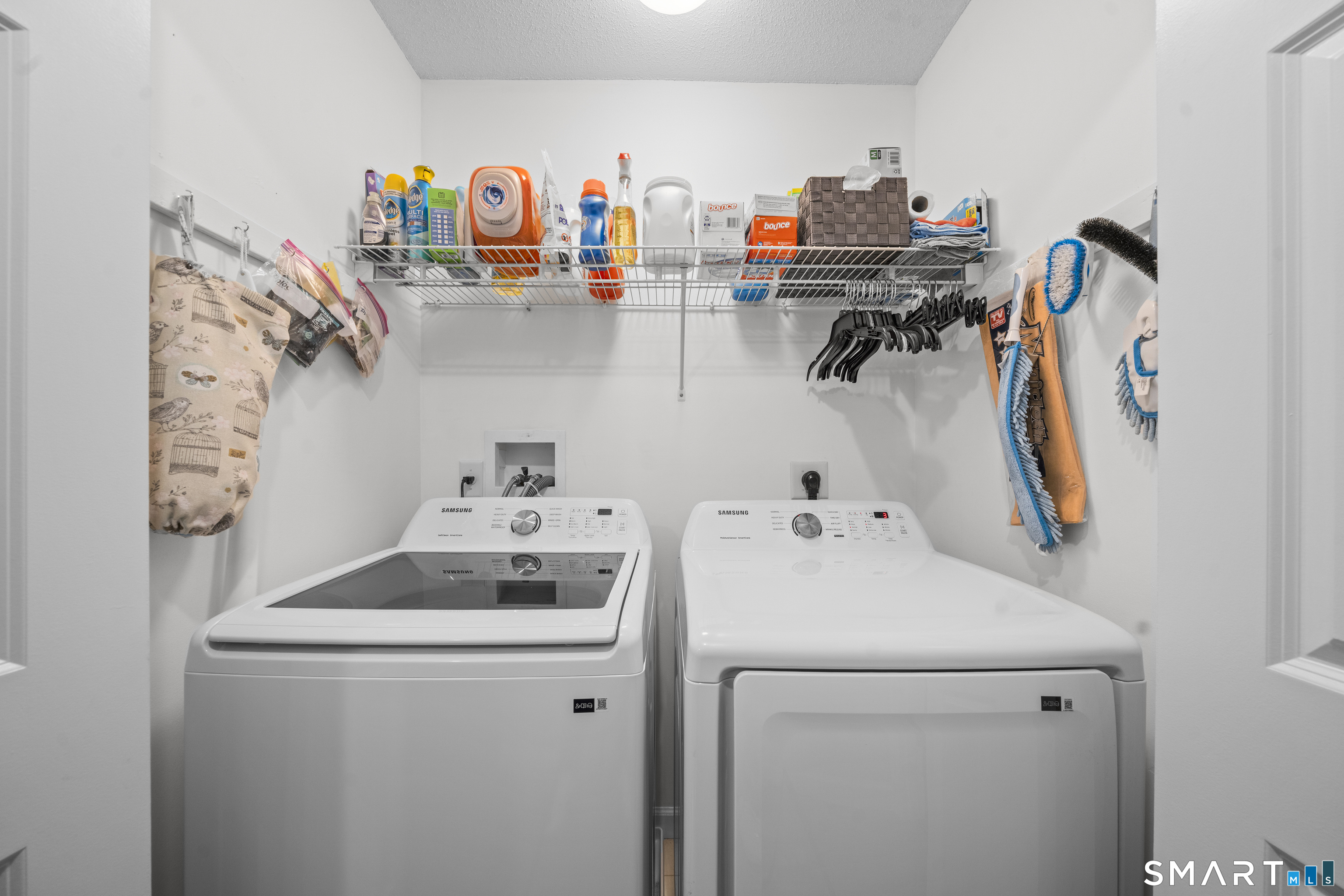 7 Heather Lane, Unit 7 Suffield, CT 06078 - Photo 21 of 34 a utility room with dryer and washer