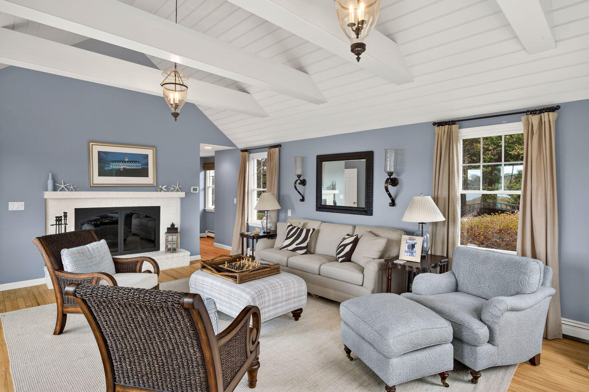 346 Morris Island Road Chatham, MA 02633 - Photo 18 of 33 a living room with furniture and a fireplace