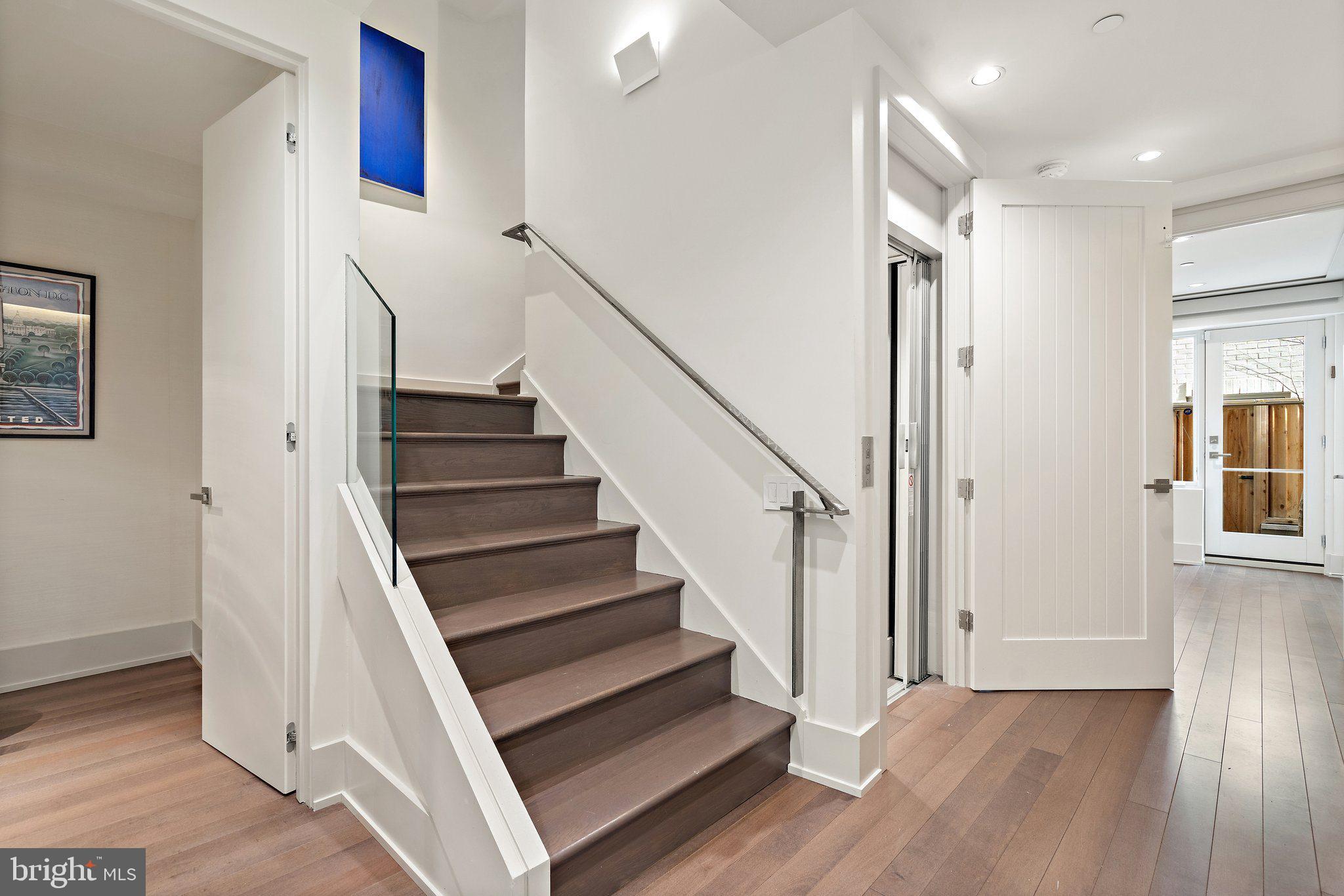 1633 33rd Street Northwest Washington, DC 20007 - Photo 4 of 50 Main stairway and private elevator!