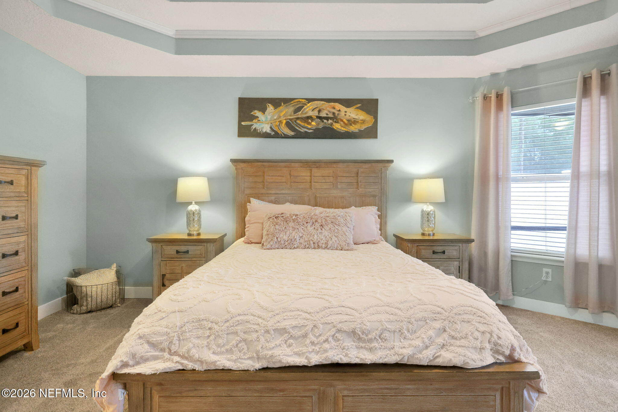 4320 Rye Court St. Johns, FL 32259 - Photo 28 of 60 a bedroom with a bed and a night stand