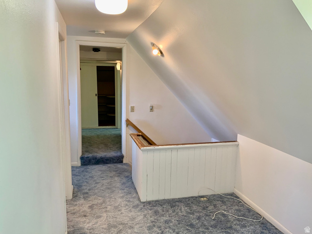 630 North Main Street Monroe, UT 84754 - Photo 25 of 63 Hallway with lofted ceiling, carpet floors, and an upstairs landing