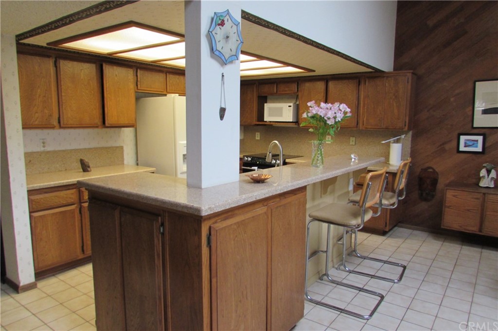 4413 Via Majorca Cypress, CA 90630 - Photo 14 of 46 a kitchen with a sink cabinets and appliances