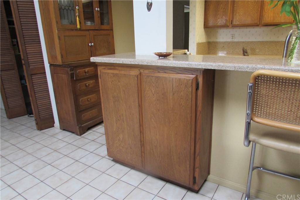4413 Via Majorca Cypress, CA 90630 - Photo 16 of 46 a kitchen with a sink and a refrigerator