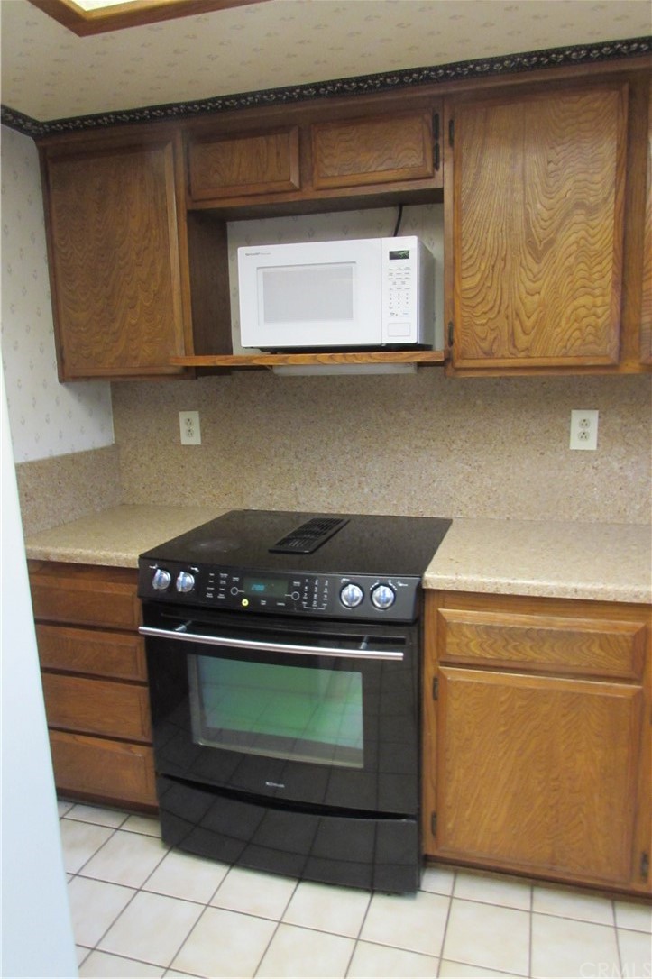 4413 Via Majorca Cypress, CA 90630 - Photo 18 of 46 a stove top oven sitting inside of a kitchen