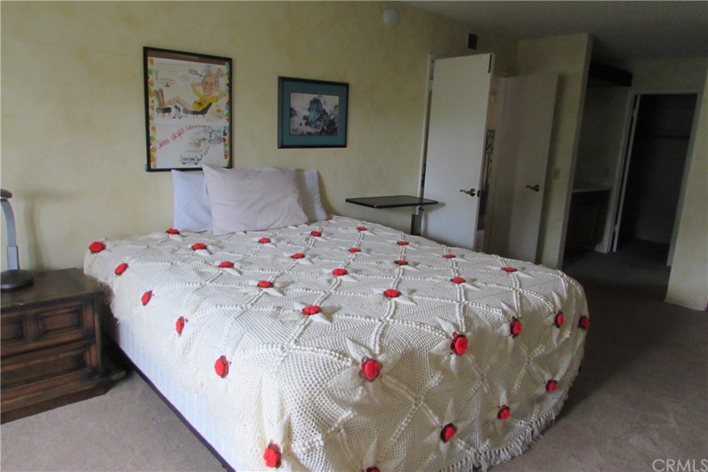 4413 Via Majorca Cypress, CA 90630 - Photo 24 of 46 a bedroom with a bed and a dresser