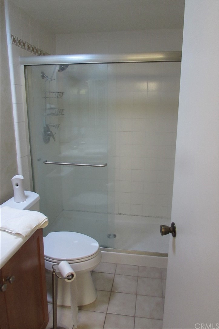 4413 Via Majorca Cypress, CA 90630 - Photo 27 of 46 a bathroom with a sink a toilet and shower
