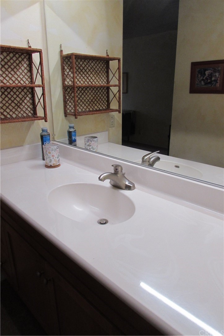 4413 Via Majorca Cypress, CA 90630 - Photo 28 of 46 a bathroom with a sink and a mirror