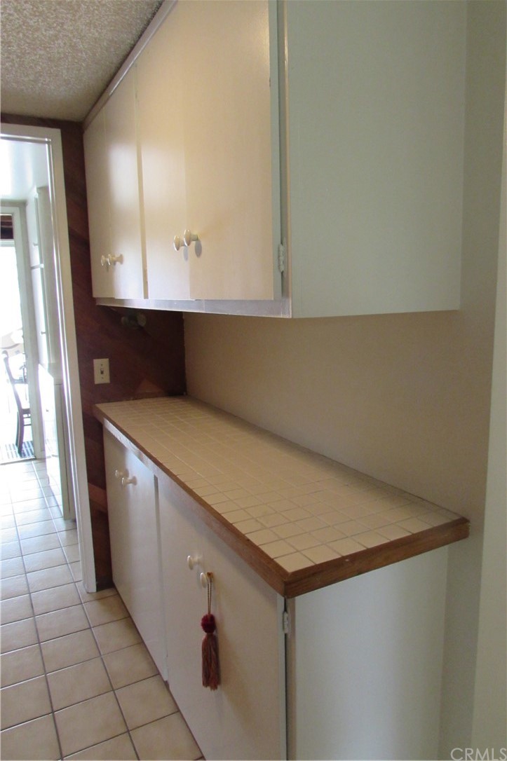 4413 Via Majorca Cypress, CA 90630 - Photo 36 of 46 a kitchen with a sink and cabinets