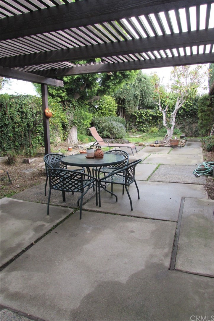 4413 Via Majorca Cypress, CA 90630 - Photo 41 of 46 a view of a patio with a table chairs and a porch