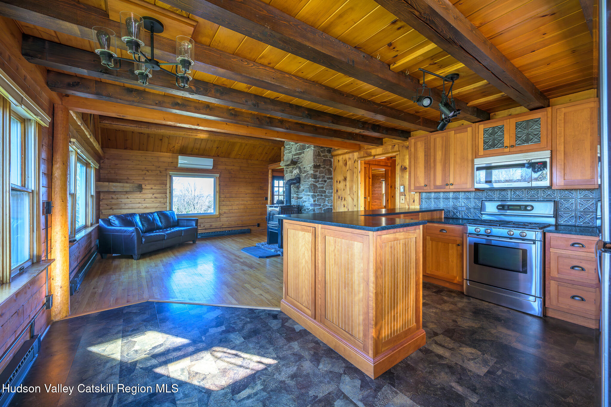 10 7 Bridges Road Old Chatham, NY 12136 - Photo 19 of 42 a kitchen with stainless steel appliances granite countertop a stove a sink and a refrigerator