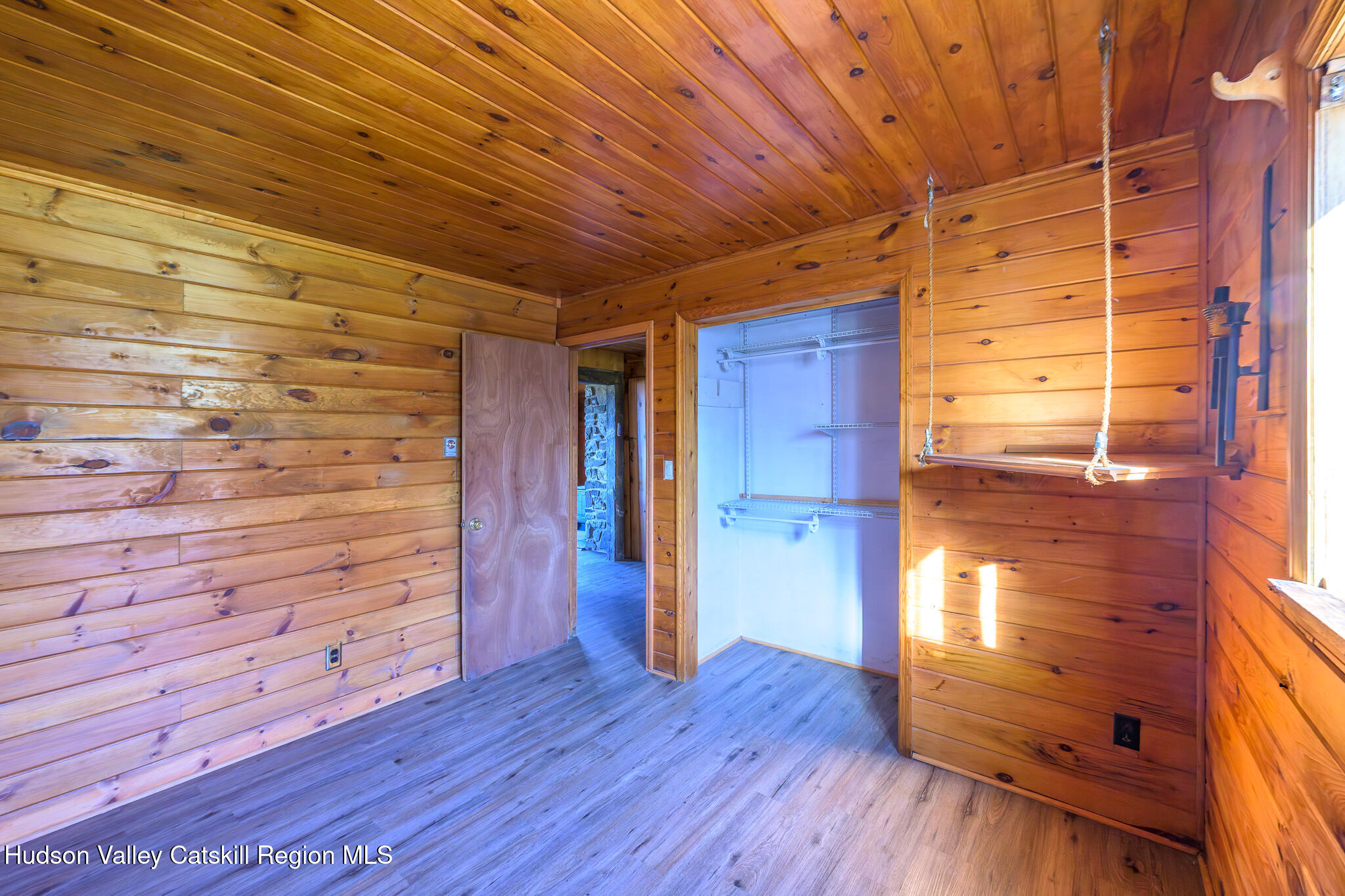 10 7 Bridges Road Old Chatham, NY 12136 - Photo 31 of 42 a view of empty room with wooden floor