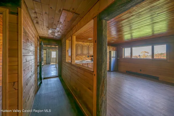 a view of a balcony with wooden floor