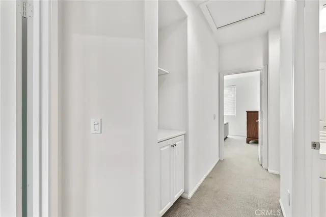 a view of a hallway with closet