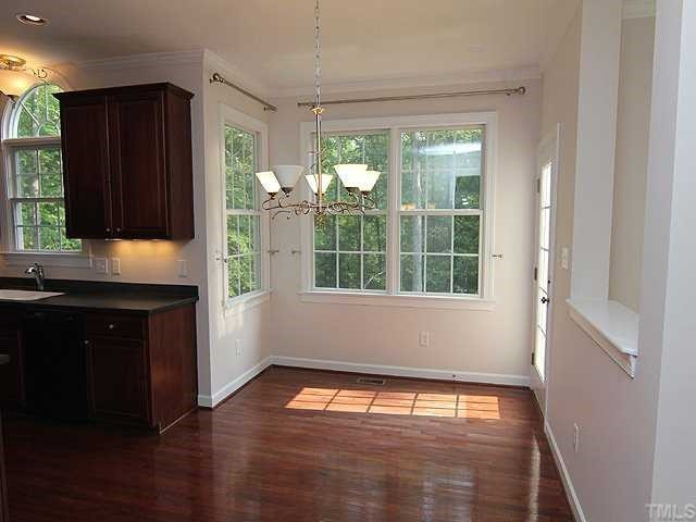 5204 6 Pence Court Raleigh, NC 27613 - Photo 5 of 17 Breakfast room with great views of the back. Breakfast Area