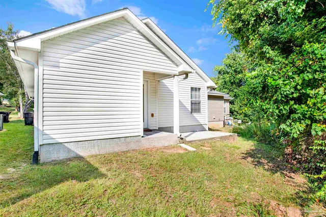 a view of a backyard with a garden
