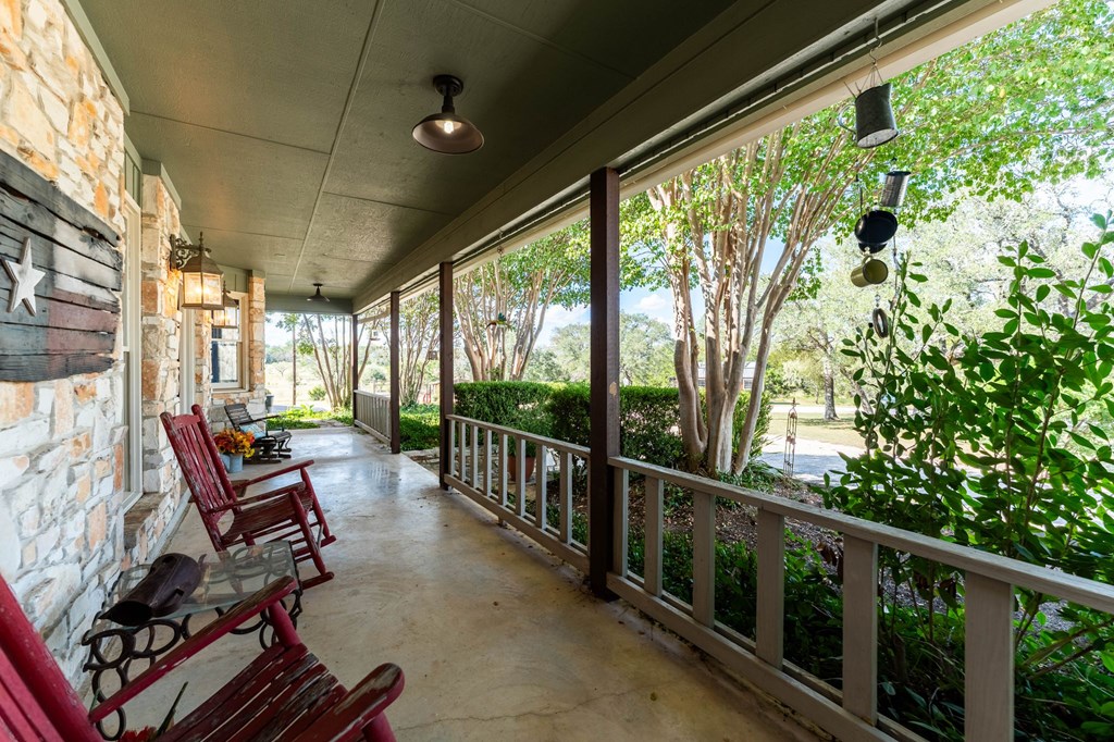43 High Street Road Comfort, TX 78013 - Photo 26 of 90 a view of a porch with furniture and wooden floor