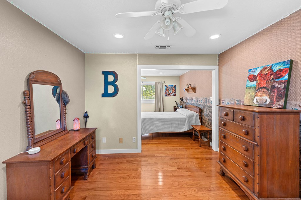 43 High Street Road Comfort, TX 78013 - Photo 66 of 90 a living room with furniture and a baby crib