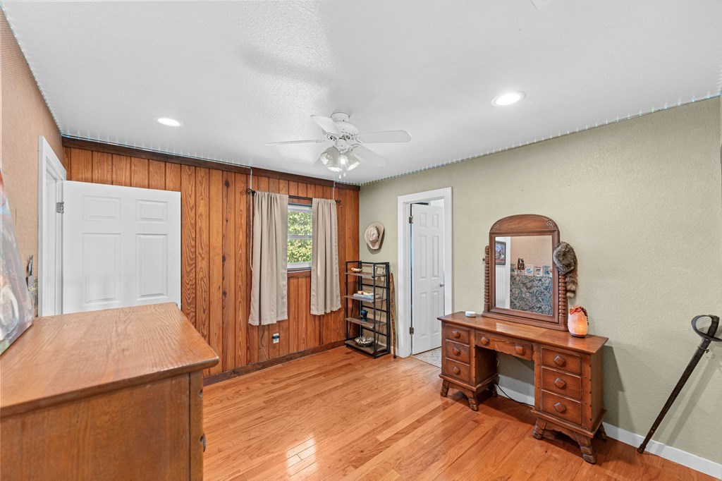 43 High Street Road Comfort, TX 78013 - Photo 67 of 90 a view of a room with furniture and wooden floor