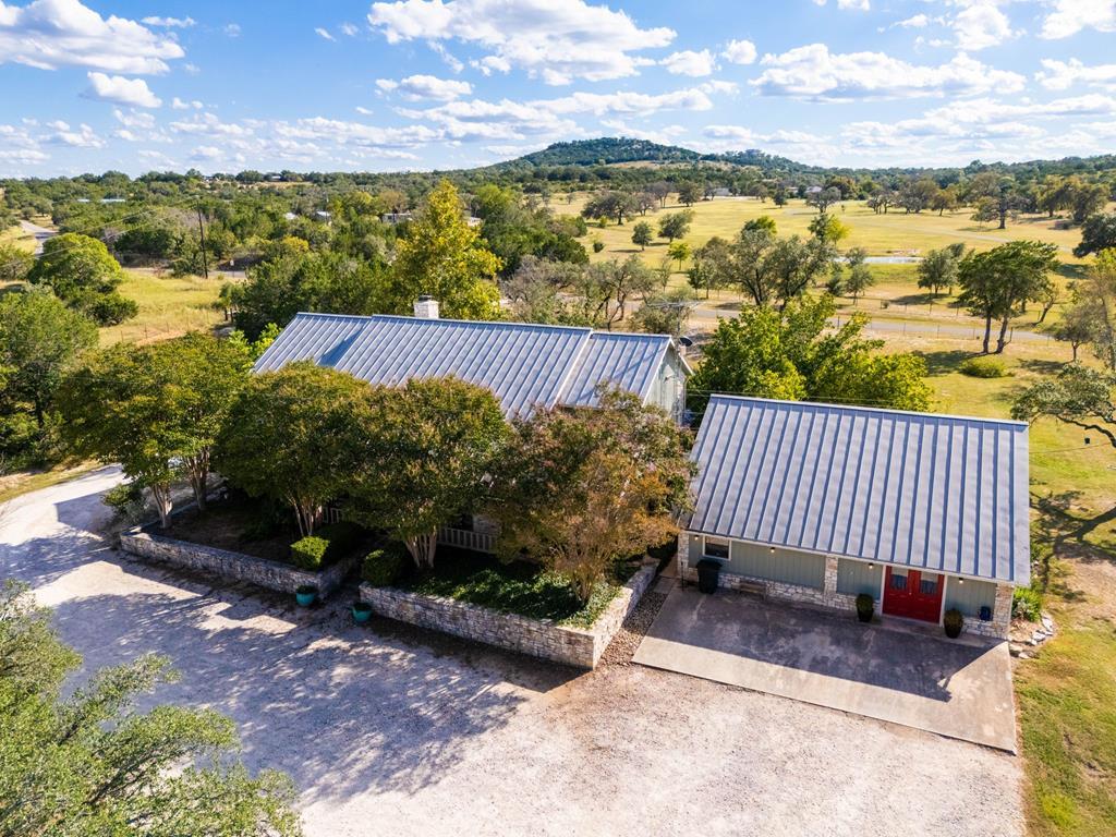 43 High Street Road Comfort, TX 78013 - Photo 7 of 90 a view of a balcony with wooden floor and city view