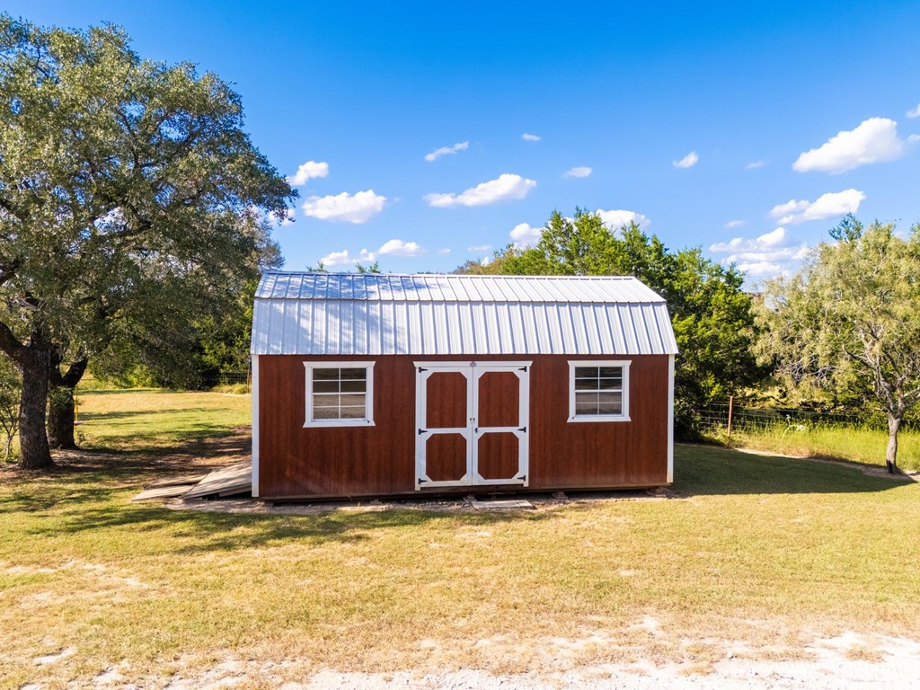 43 High Street Road Comfort, TX 78013 - Photo 89 of 90 a view of a house with a yard