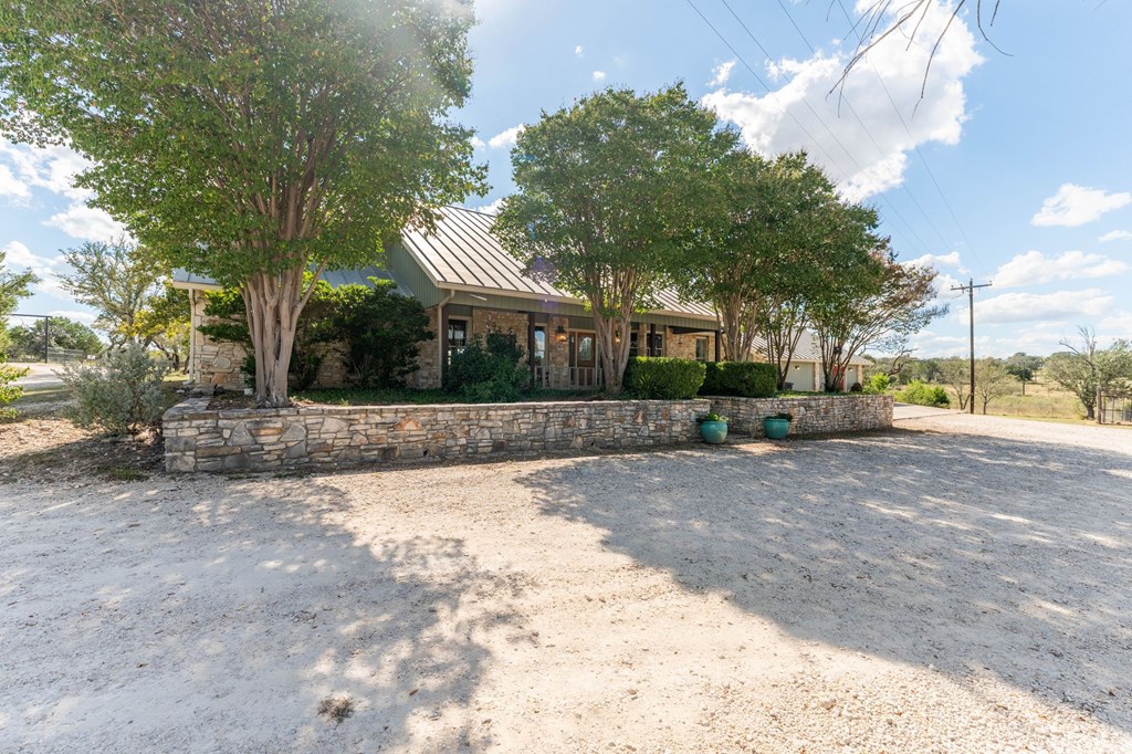 43 High Street Road Comfort, TX 78013 - Photo 9 of 90 a view of a yard with plants and trees