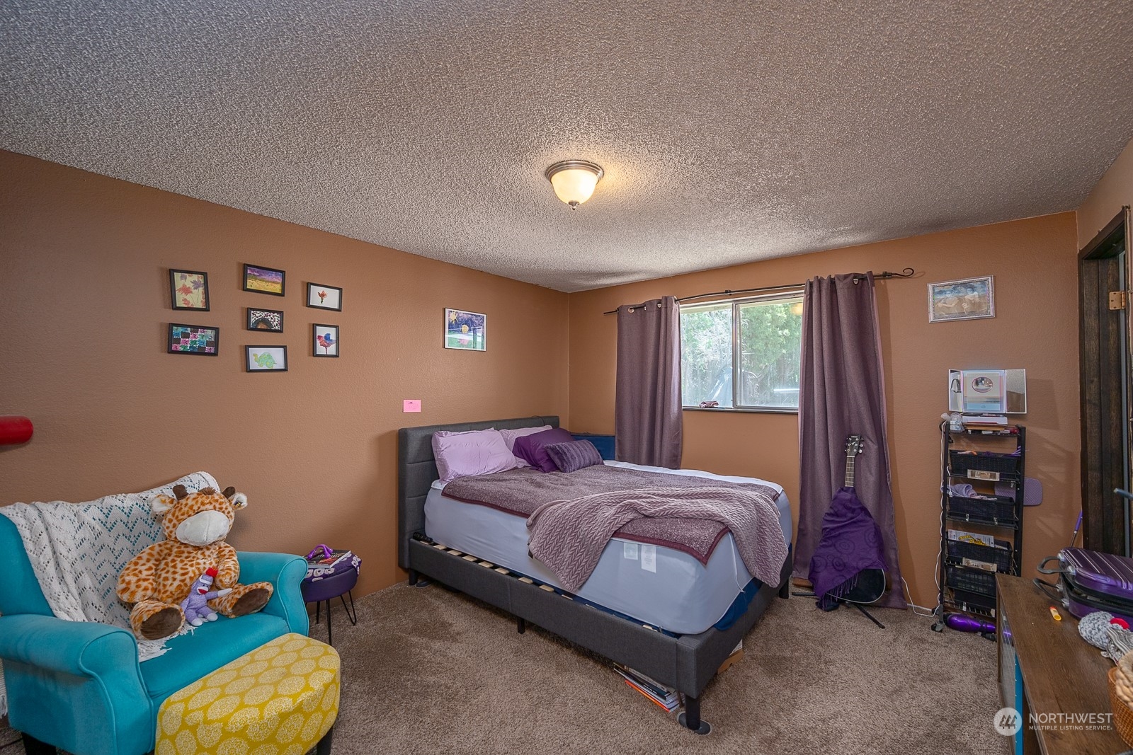 329 Maringo Road Ephrata, WA 98823 - Photo 13 of 18 a bedroom with a bed and a window