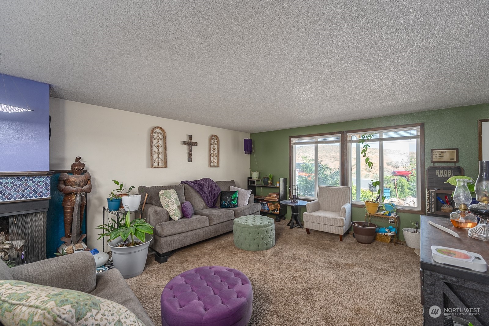 329 Maringo Road Ephrata, WA 98823 - Photo 4 of 18 a living room with furniture and a large window