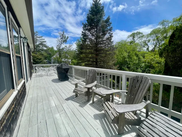 a view of roof deck with patio