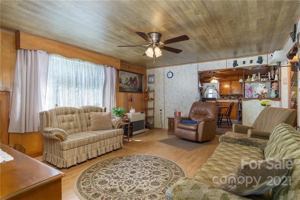 10200 Highway 23 Cheboygan, MI 49721 - Photo 7 of 14 a living room with furniture and a large window