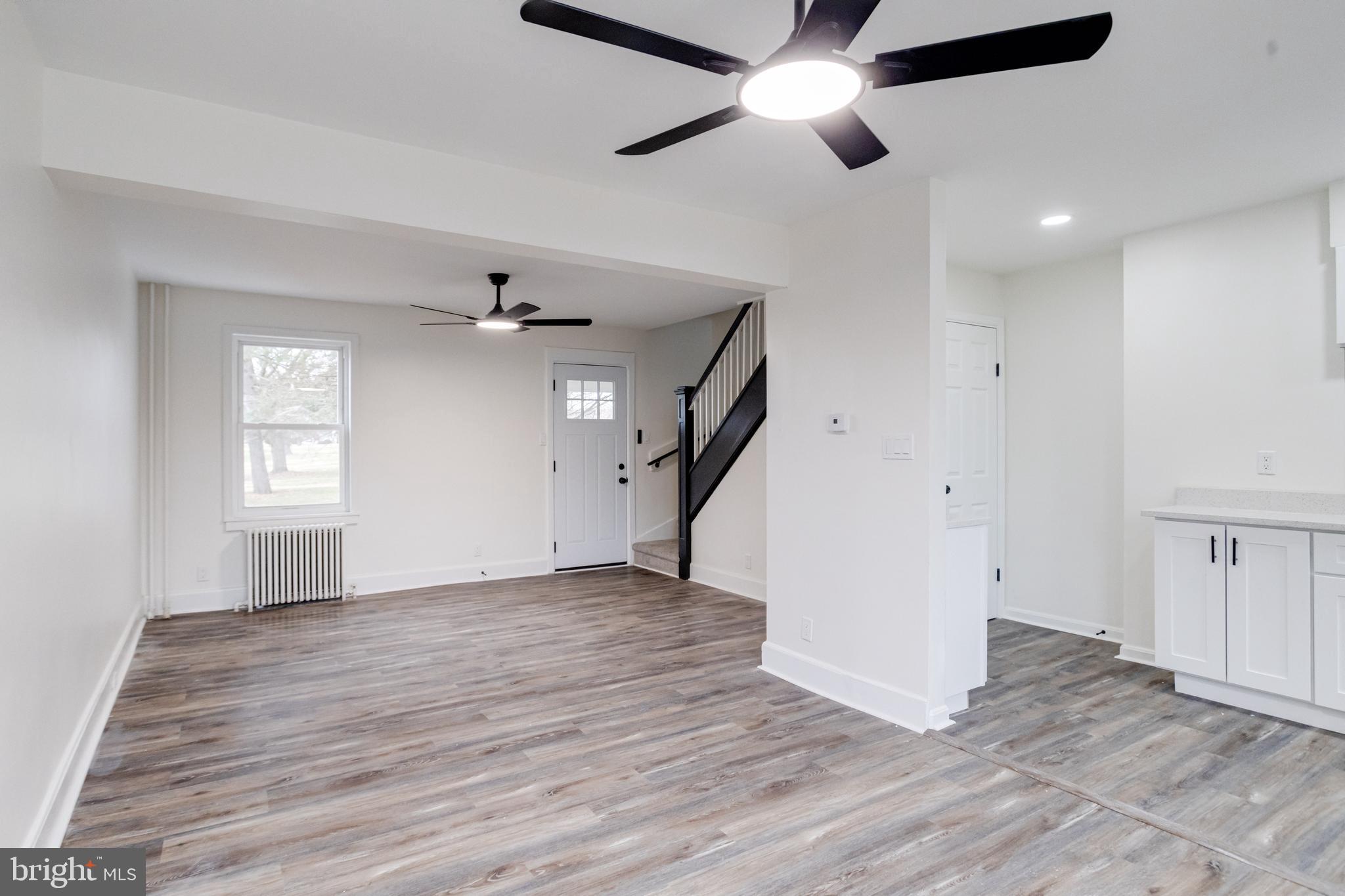 44 Shipway Baltimore, MD 21222 - Photo 14 of 53 wooden floor in an empty room with a window