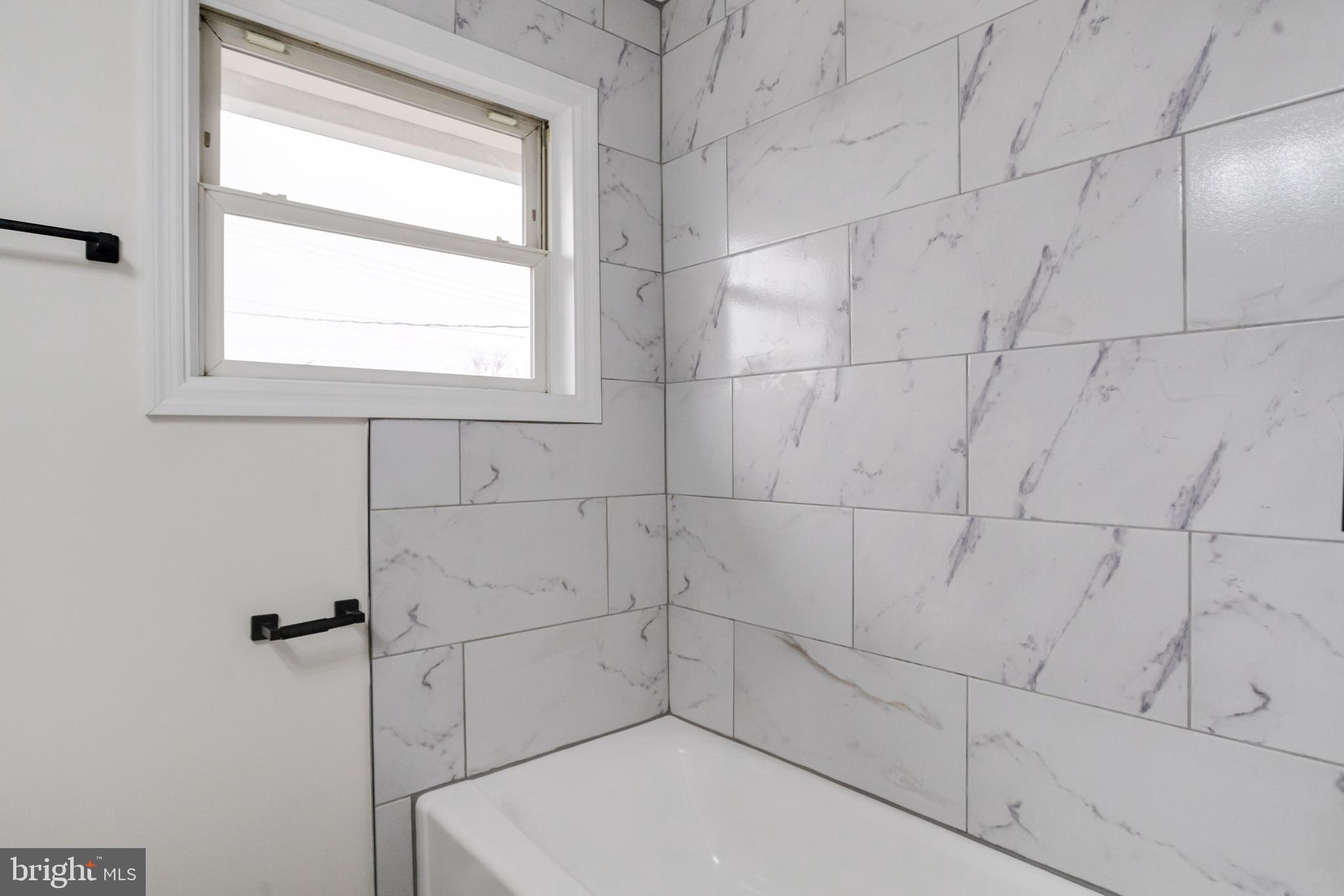 44 Shipway Baltimore, MD 21222 - Photo 33 of 53 a bathroom with a bathtub