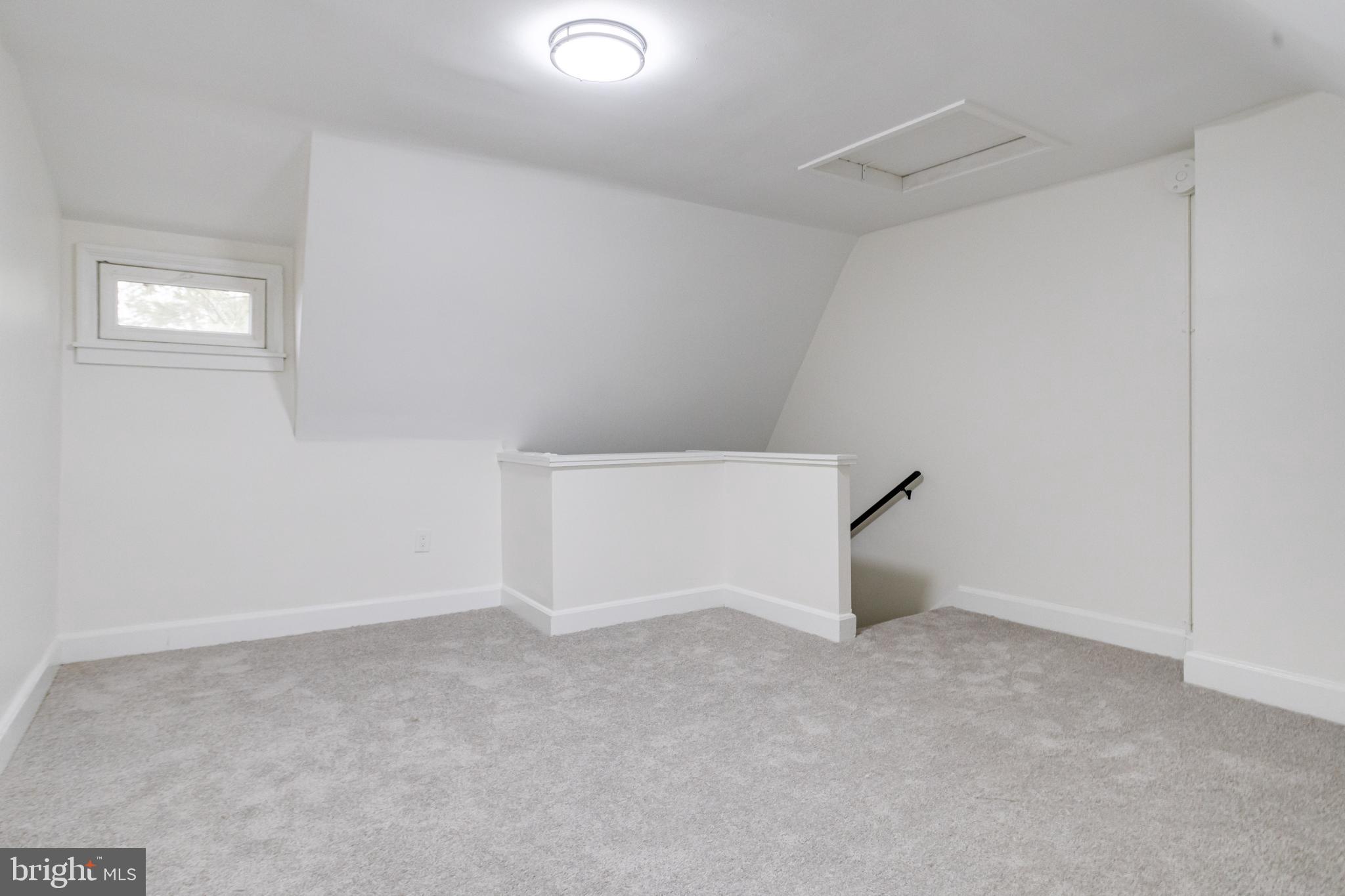 44 Shipway Baltimore, MD 21222 - Photo 39 of 53 a view of an empty room and a window