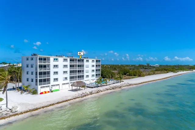 a view of swimming pool with outdoor seating and yard