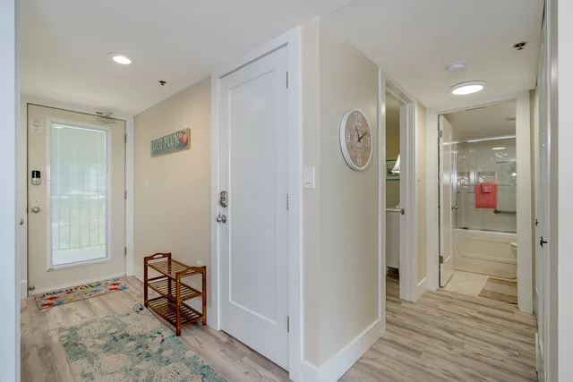 a view of room with wooden floor