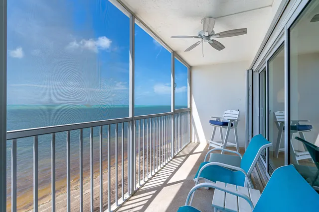 a view of a hallway with furniture