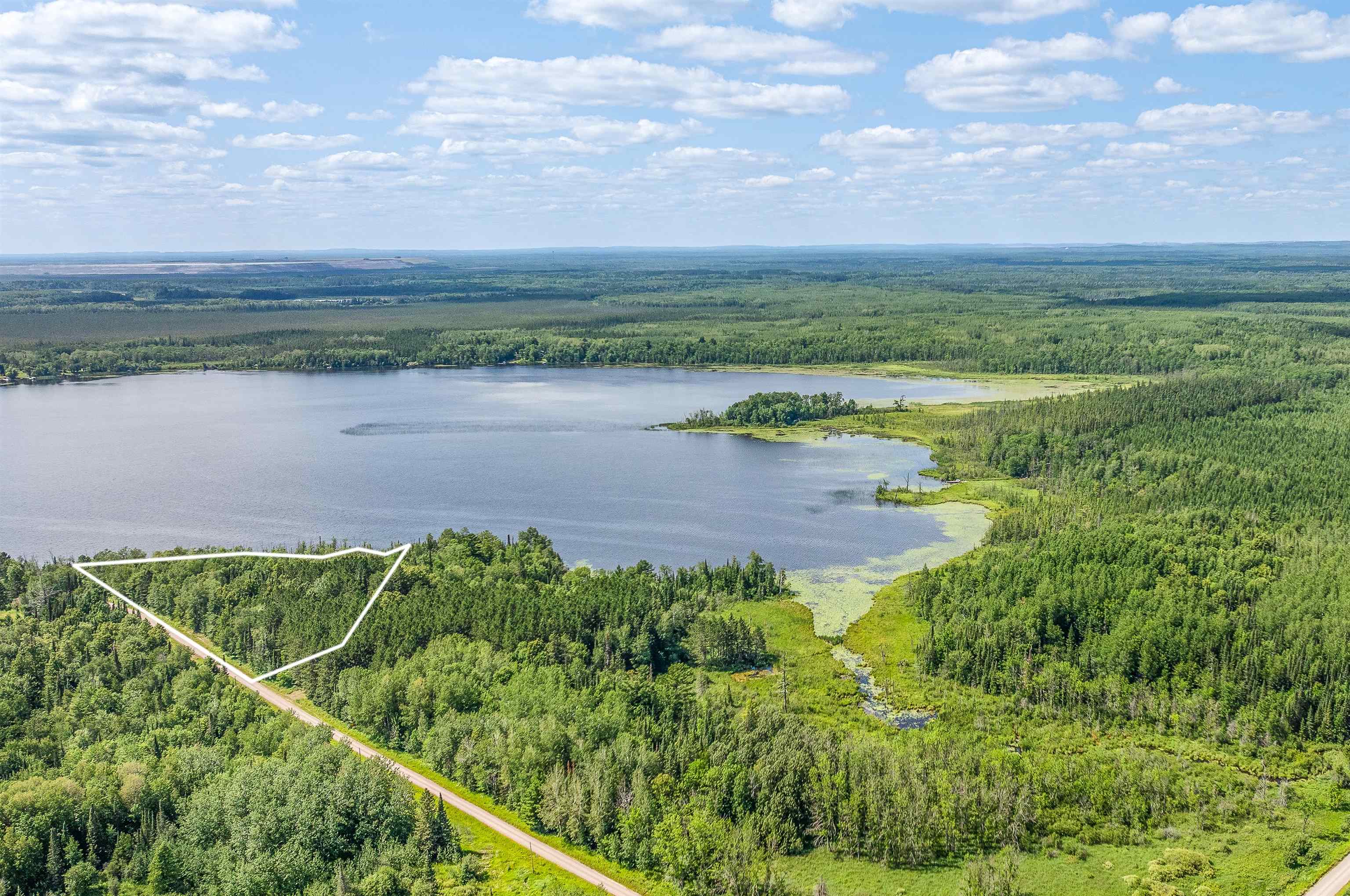 Tbd Jola Road Eveleth, MN 55734 - Photo 12 of 12 Aerial view of property's location with property parcel outlined and a large body of water