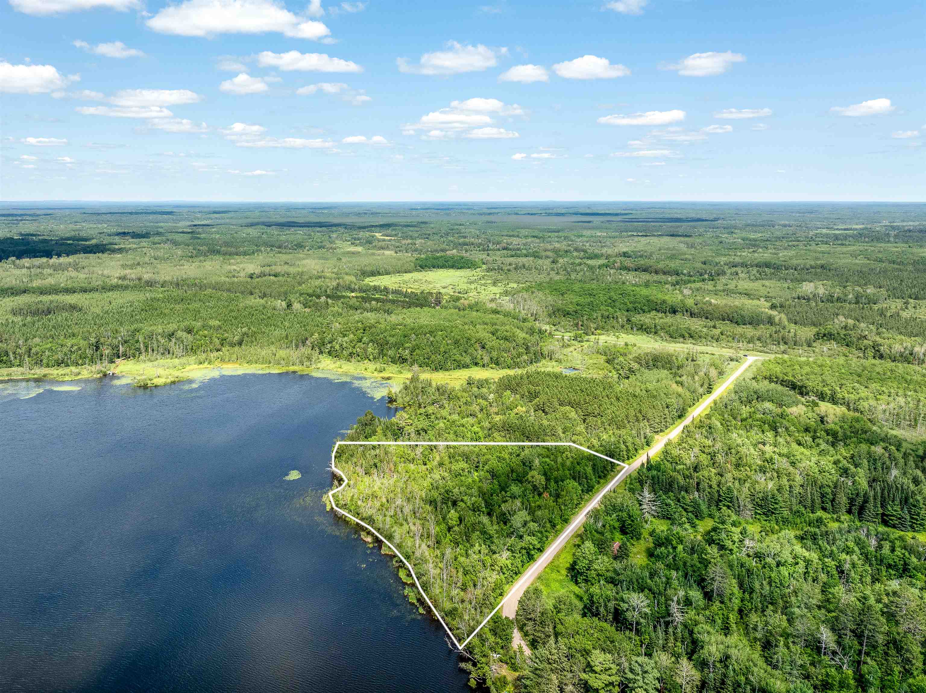 Tbd Jola Road Eveleth, MN 55734 - Photo 9 of 12 Aerial overview of property's location with property parcel outlined and a large body of water