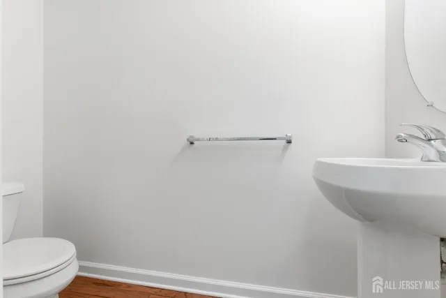 a bathroom with a sink and a toilet