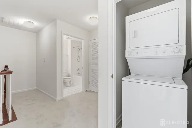 a bathroom with a toilet and a sink