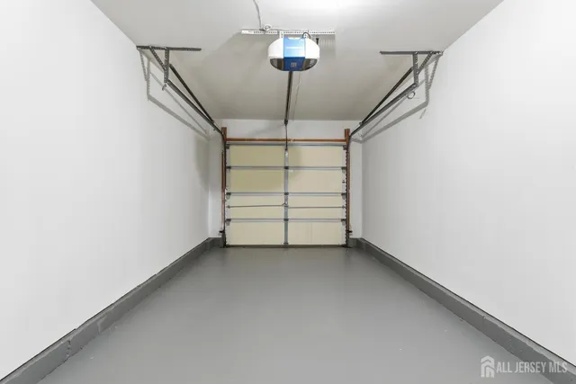 a view of room with stairs and a ceiling fan